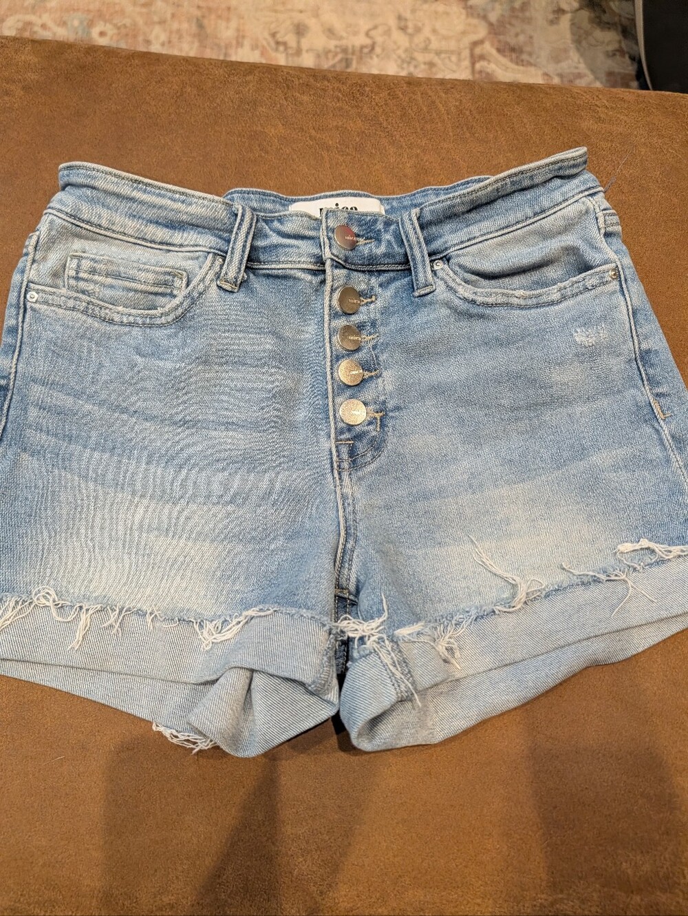 High-Rise Light Blue Denim Shorts with Button Front